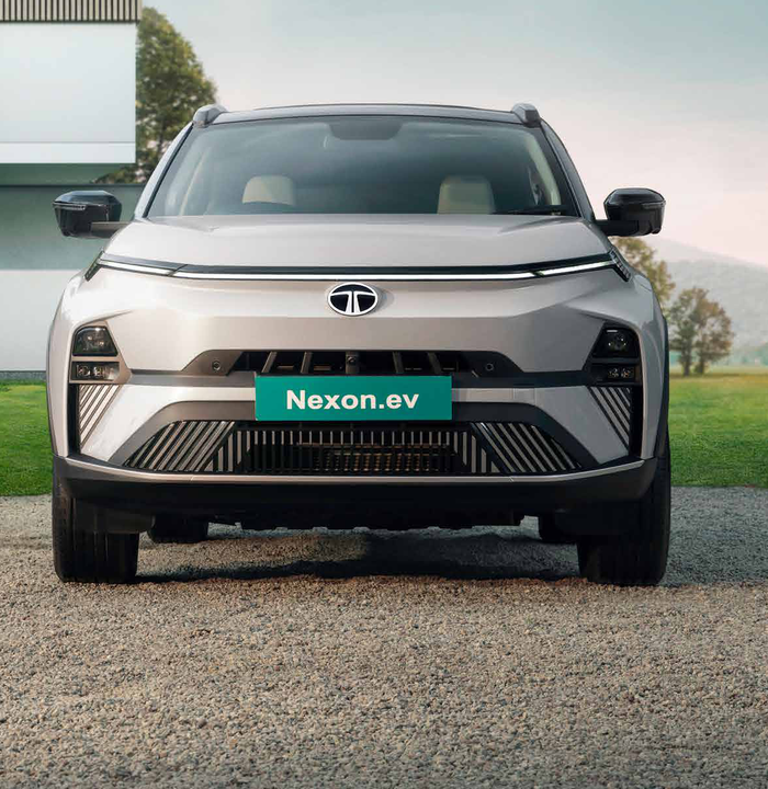 Tata Nexon EV — Full-width smart digital light bar with integrated charging indicator above the closed-off EV fascia