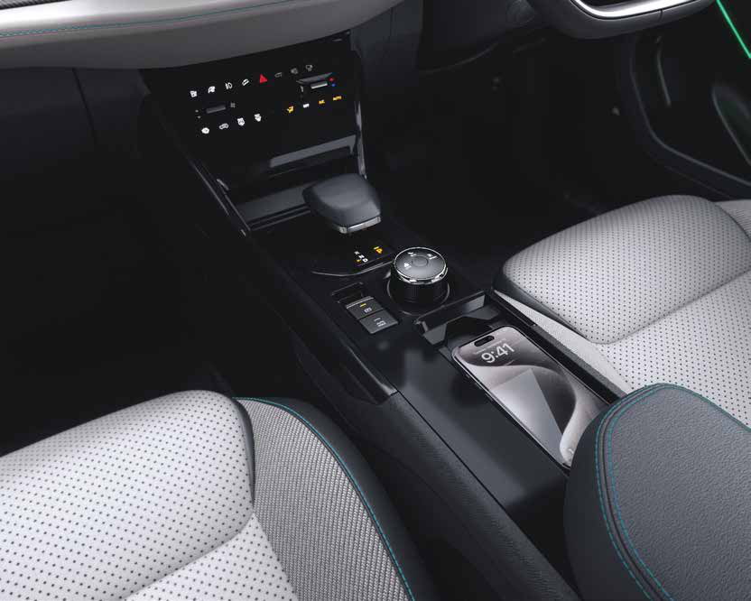 Tata Curvv EV — Wireless smartphone charger next to the smart digital shifter on the console
