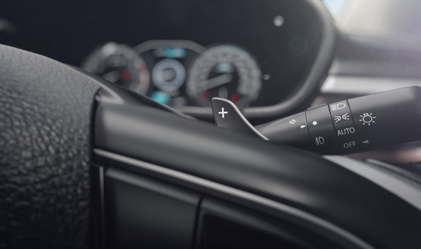 Maruti Suzuki Brezza (2022-2025) — Steering-mounted paddle shifters for the 6-speed automatic.