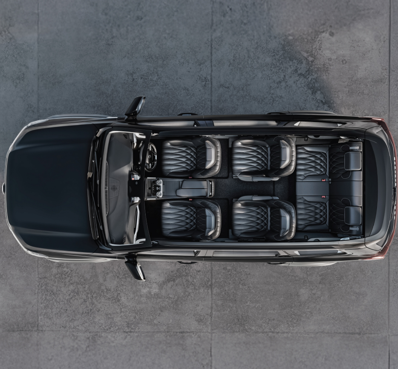 MG Majestor — Top-down view of the M-Lounge cabin with quilted leather-accented captain and bench seating