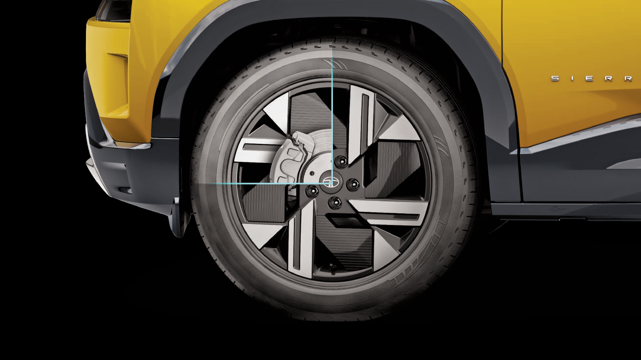 Tata Sierra — Dual-tone aero-style alloy wheels; disc brakes on all four wheels