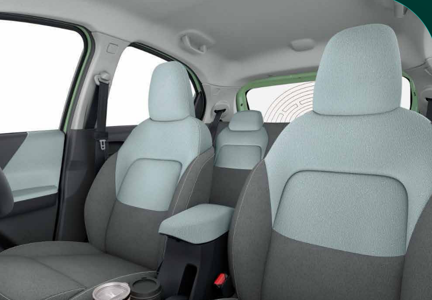 Tata Tiago EV — Premium melange fabric seats in a dual-tone grey theme with front-seat armrest