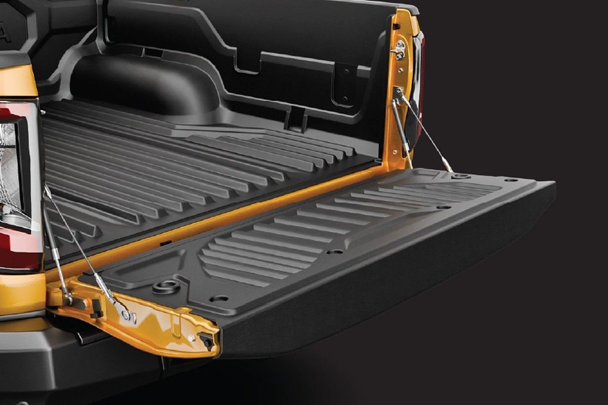 Toyota Hilux — Tough load deck with tailgate-assist and tie-down points for serious payloads.