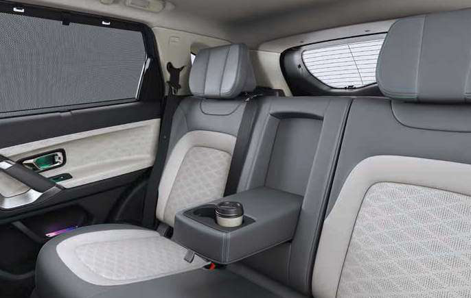Tata Harrier EV — Rear lounge comforts - window sunshades, comfort headrests and a rear armrest with cup holder