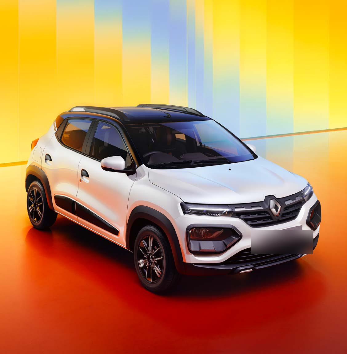 Renault Kwid — Sporty front fascia with LED daytime running lights, black body cladding and a bold Renault grille.