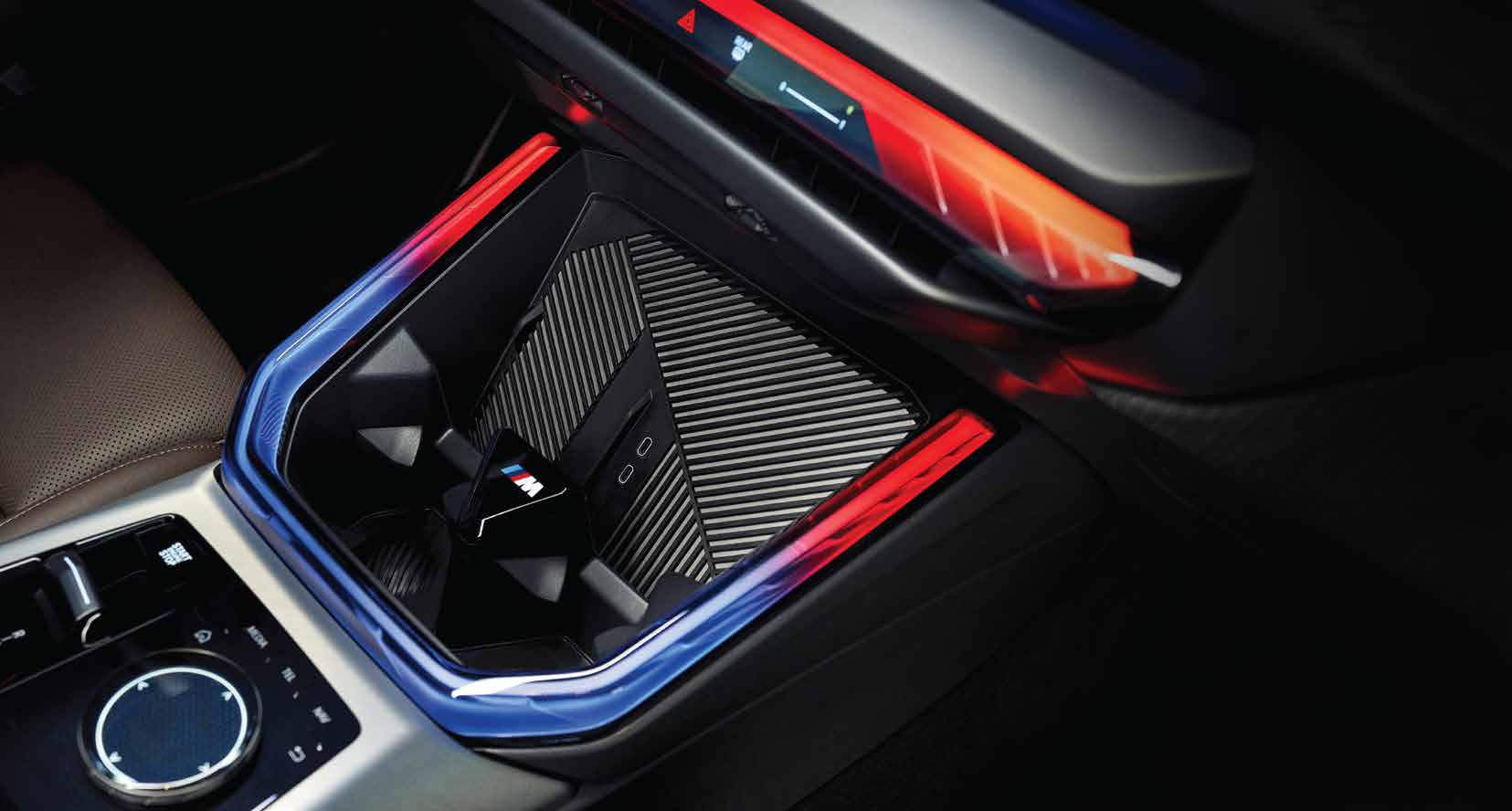 BMW X3 — Centre-console jewellery box with integrated wireless charging and crystal-cut ambient lighting