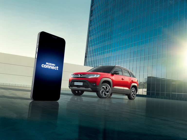Maruti Suzuki Brezza (2022-2025) — Electric sunroof over the dual-tone cabin.