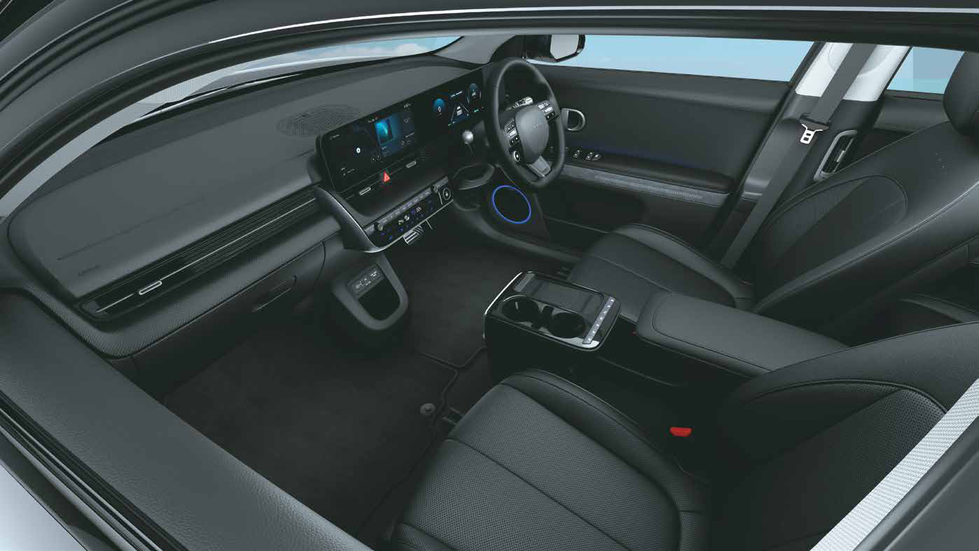 Hyundai Ioniq 5 — Sliding centre console with cupholders and armrest