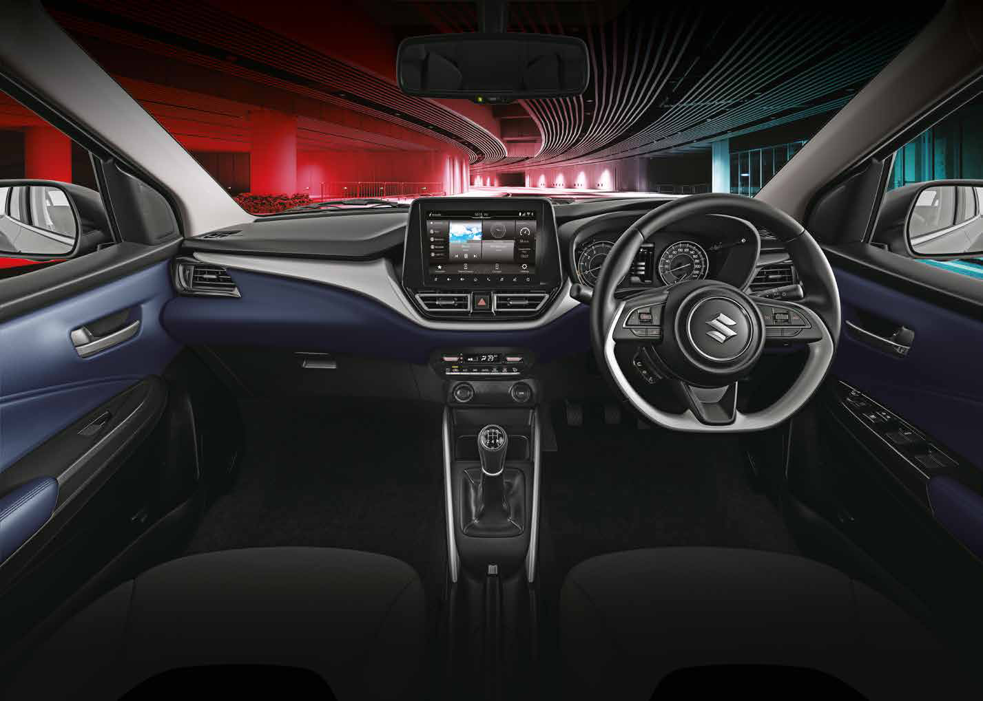 Maruti Suzuki Baleno — Dual-tone dashboard with piano-black inserts, 9-inch SmartPlay Pro+ touchscreen and analogue twin-dial cluster.