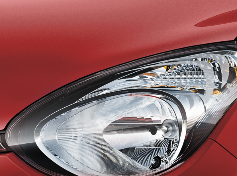 Maruti Suzuki Celerio — Clear-lens headlamp cluster with multi-reflector housing