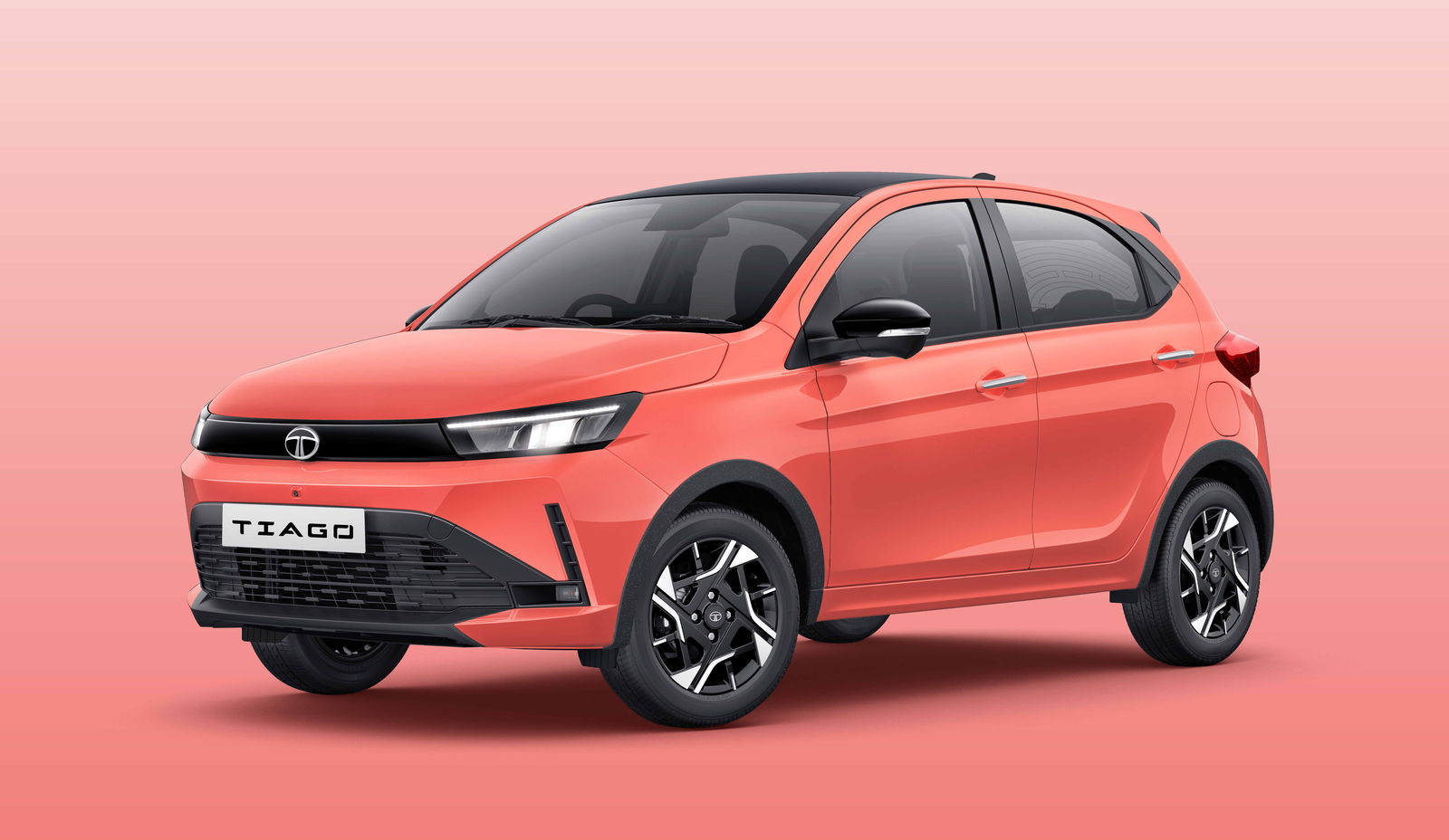 Tata Tiago — Lux Beam LED headlamps with integrated LED DRLs flank the gloss-black bar above the sporty wide lower front grille