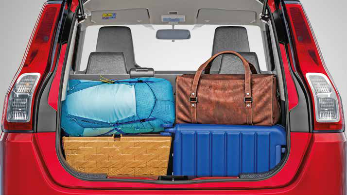 Maruti Suzuki Wagon R — Dual-tone cabin with fabric-trimmed front bucket seats and a rear bench.
