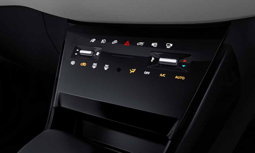 Tata Nexon EV — Phygital control panel - touch HVAC controls paired with physical toggles