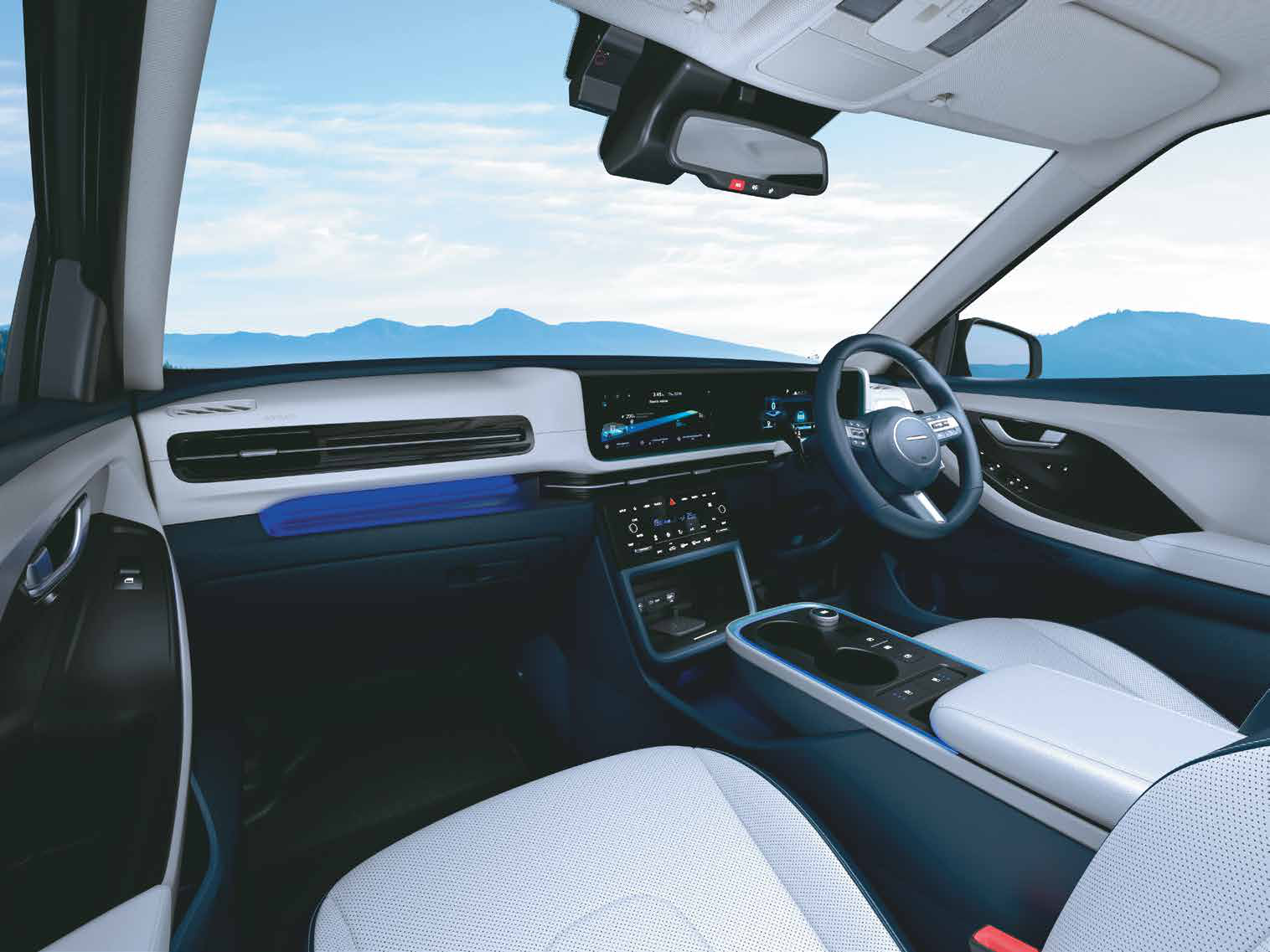 Hyundai Creta Electric — Dual-tone navy and grey cabin with dual 26.03 cm (10.25") curvilinear screens