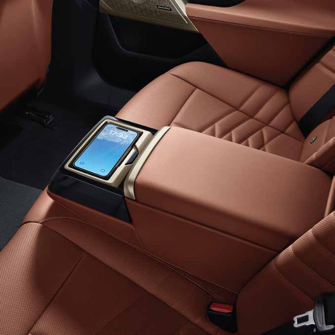 BMW 5 Series  — Rear-seat device holder with 360-degree rotation and adjustable viewing angle