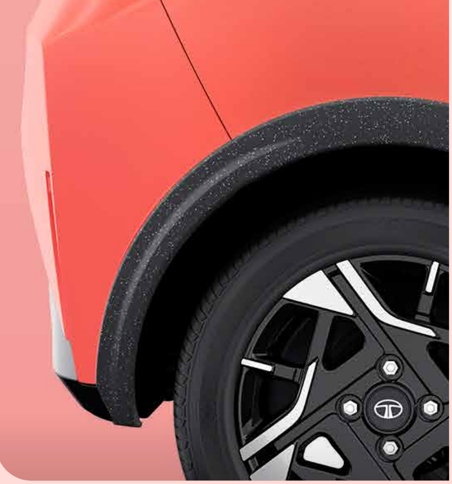 Tata Tiago — Cosmo grain textured wheel arch cladding adds a speckled-black, rugged and protective character to every arch