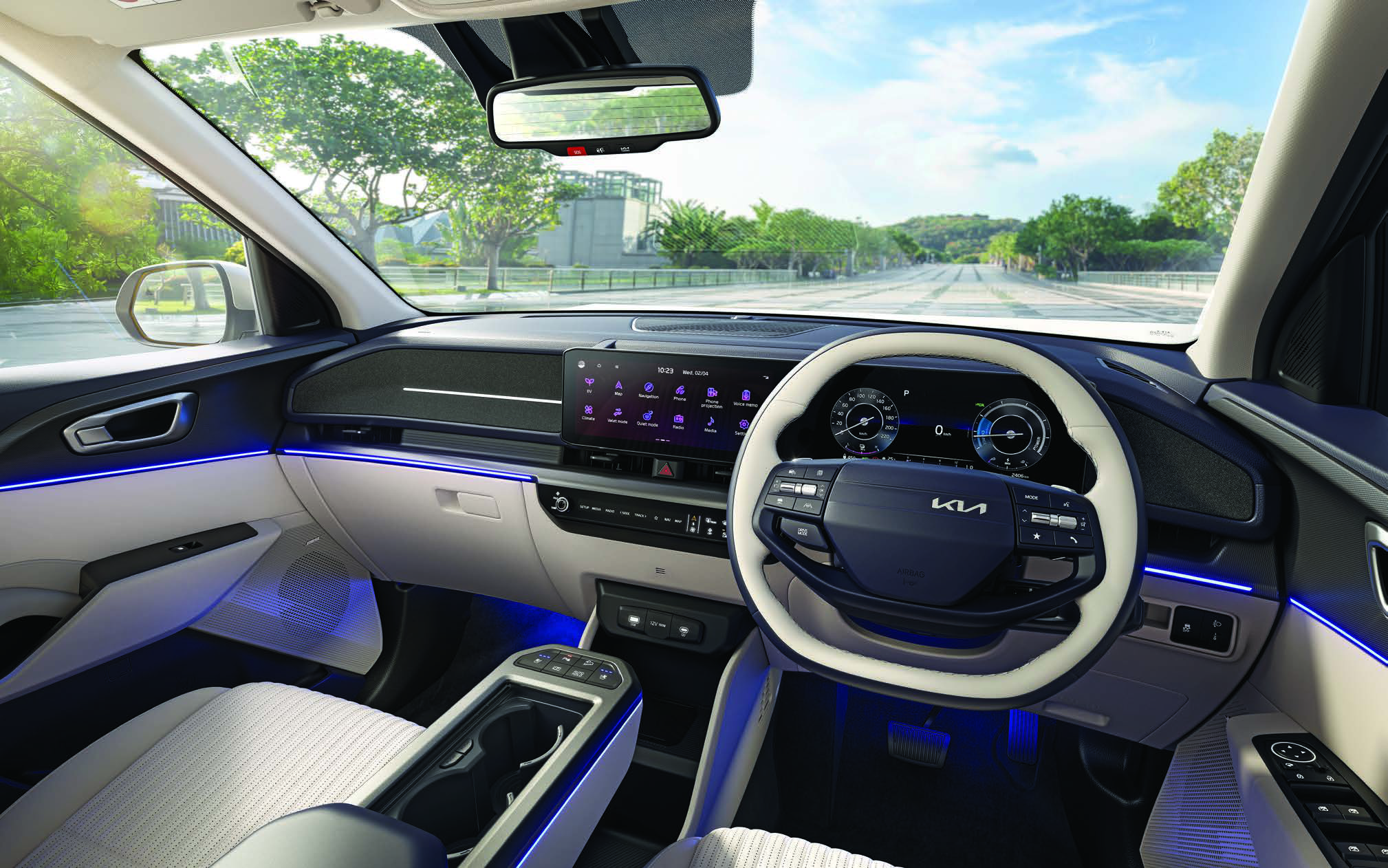 Kia Carens Clavis EV — Driver-focused cockpit with 64-colour ambient lighting and dual panoramic display