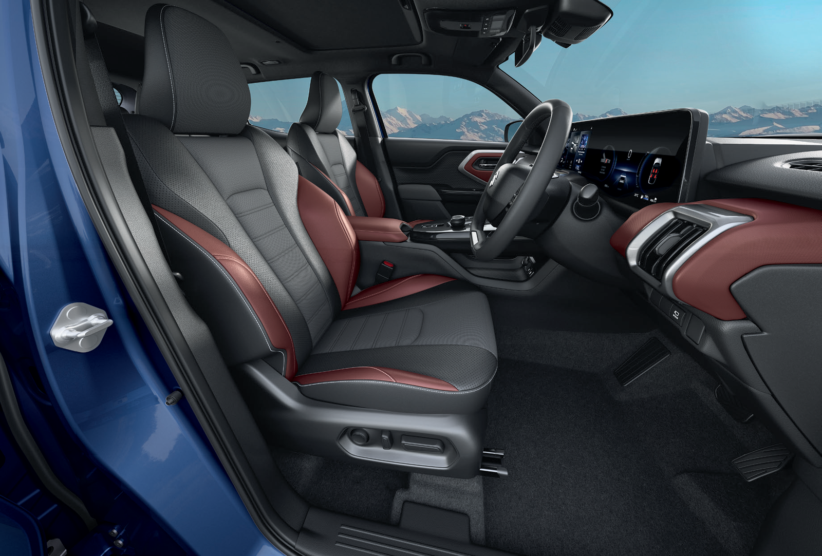 Maruti Suzuki e Vitara — Dual-tone black and maroon leatherette front seats with perforated inserts and contrast stitching.