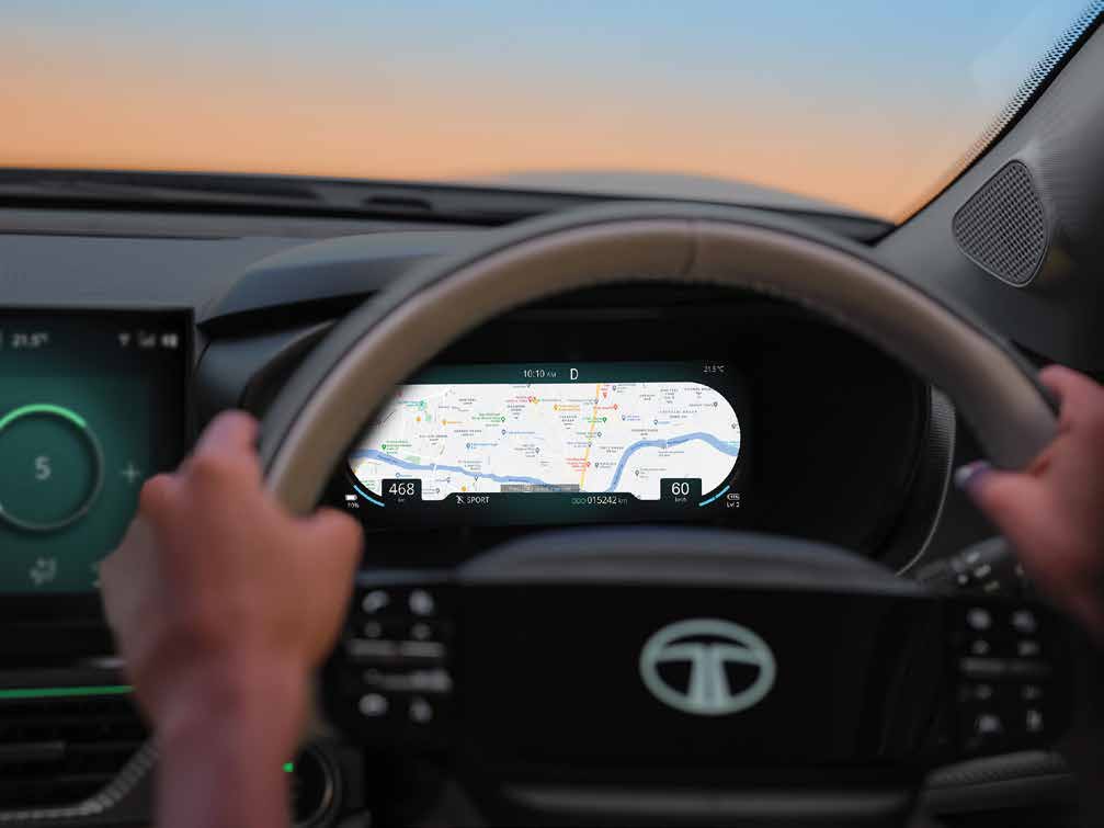 Tata Curvv EV — 26.03 cm digital cockpit with driver-view maps and multi dial views
