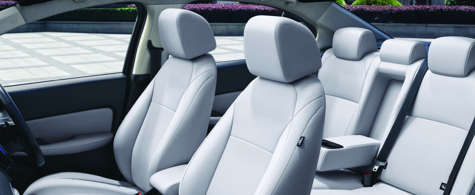 Honda City — Perforated ivory leather seats in an ivory and black two-tone cabin