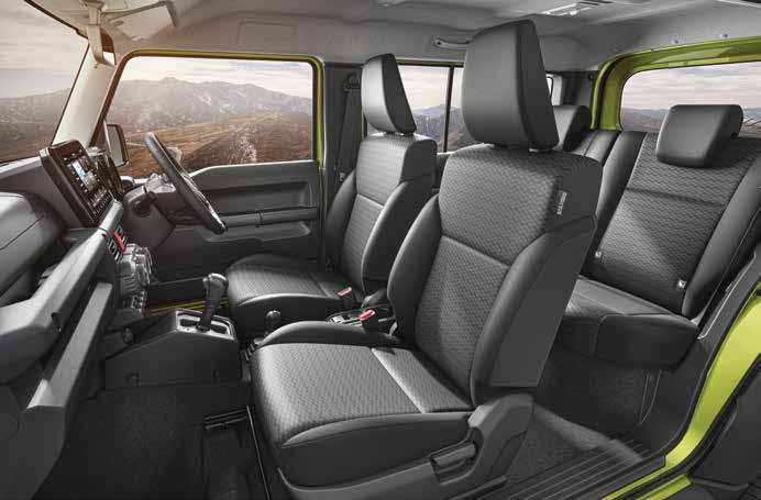 Maruti Suzuki Jimny — Fabric front and rear seats in the four-seat cabin layout.