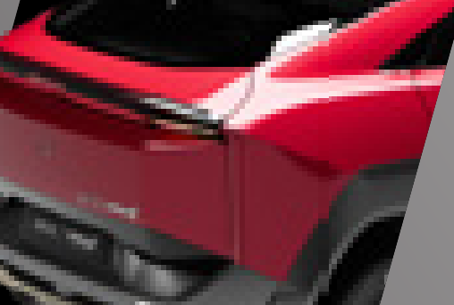 Mahindra BE 6 FE — Sporty rear profile with roof and boot-lip spoilers and full-width connected LED tail lamp