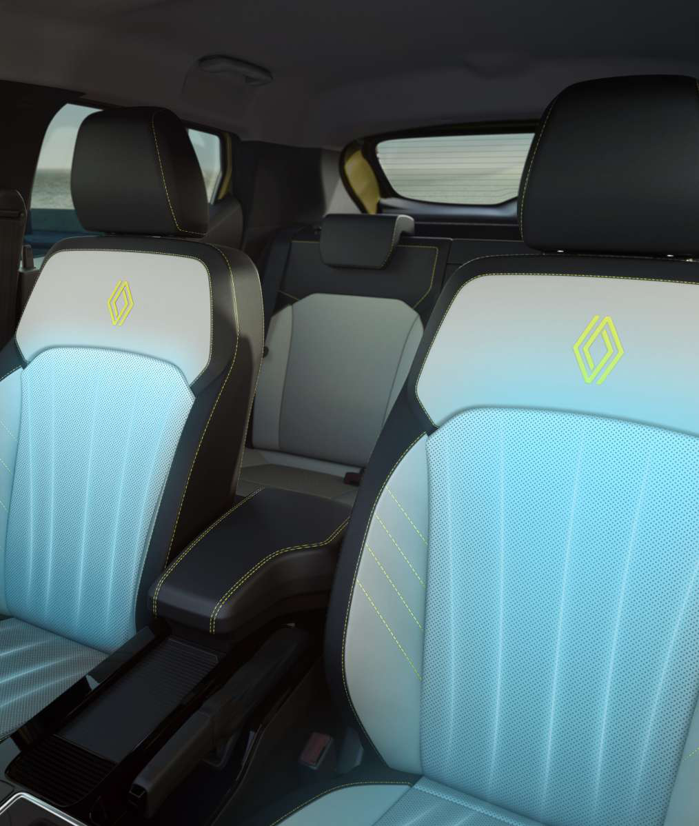 Renault Kiger — Two-tone ventilated leatherette front seats with contrast stitching and an embossed Renault logo.