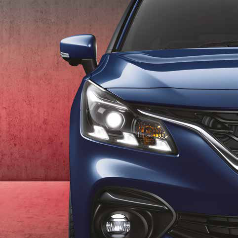Maruti Suzuki Baleno — LED projector headlamp with NEXtri LED daytime running light signature.