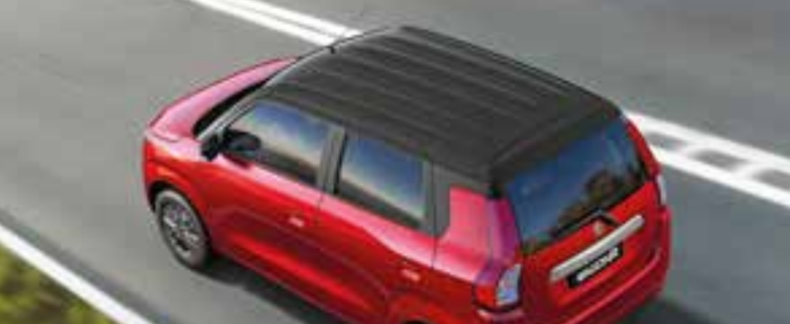 Maruti Suzuki Wagon R — Sporty floating-roof effect created by blacked-out pillars beneath a contrast black roof.