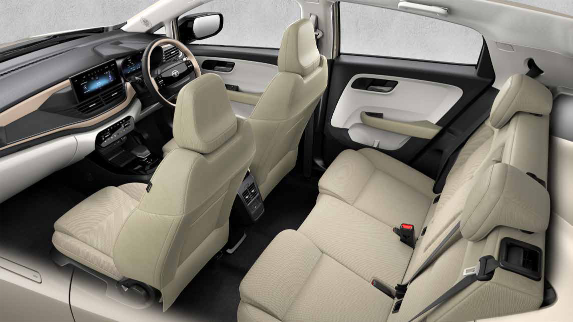 Tata Altroz — Dual-tone cabin with plush fabric seats and the 3-tone Grand Prestigia soft-touch dashboard