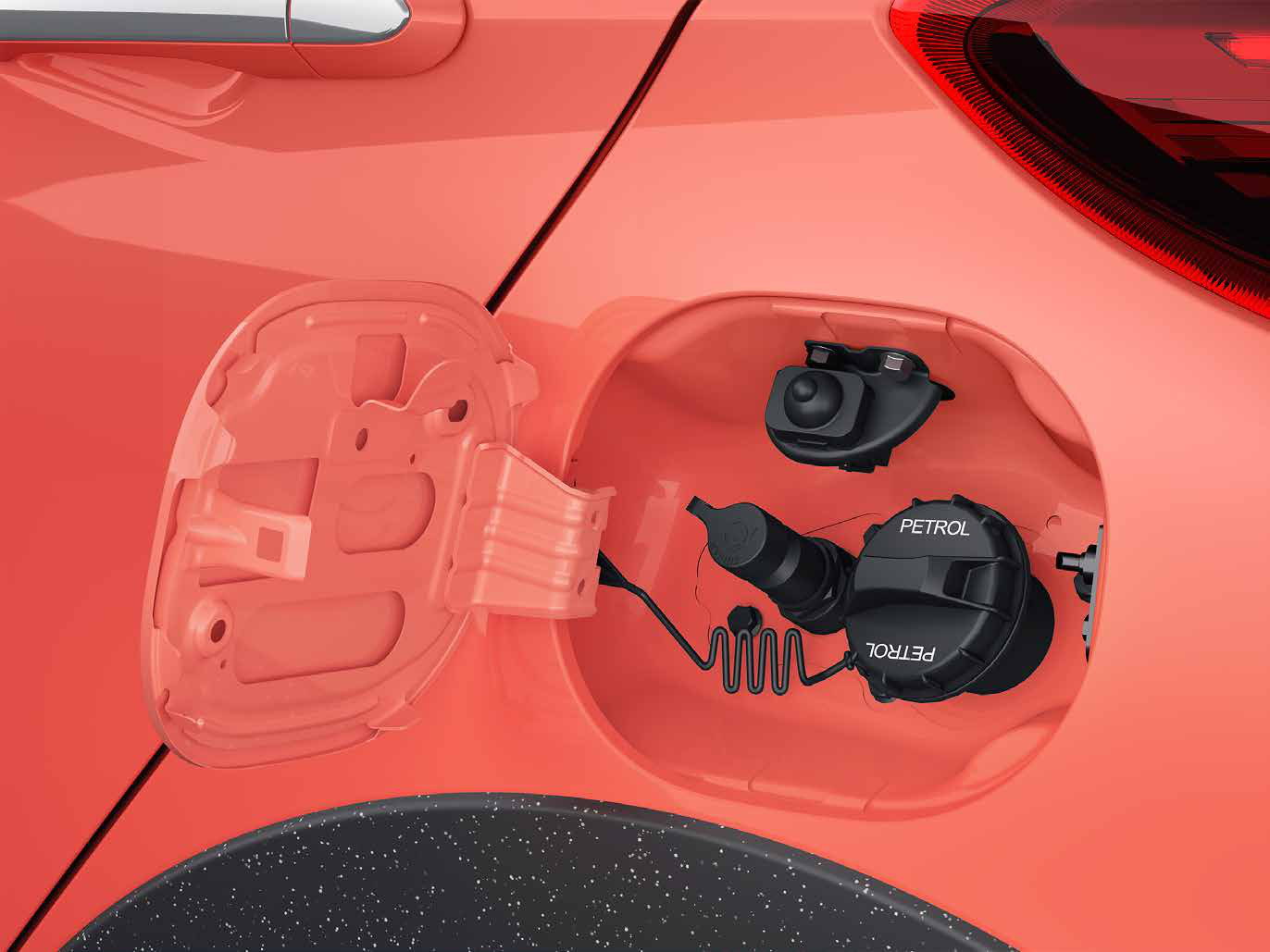 Tata Tiago — Tiago iCNG houses the petrol filler and CNG filling nozzle under a single fuel flap