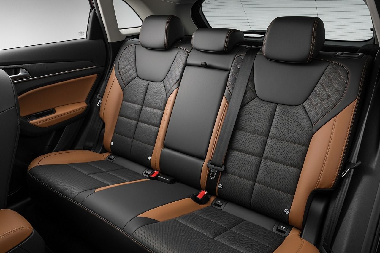 Maruti Suzuki Brezza — Plush leatherette upholstery in a dual-tone brown and black finish.