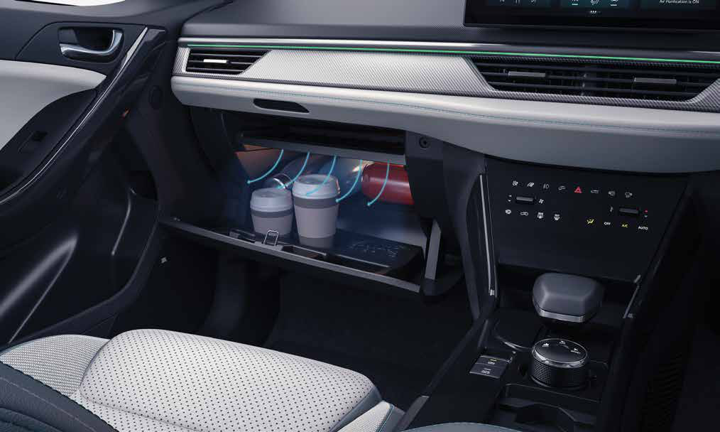 Tata Curvv EV — Cooled and illuminated glove box keeps drinks chilled on the go