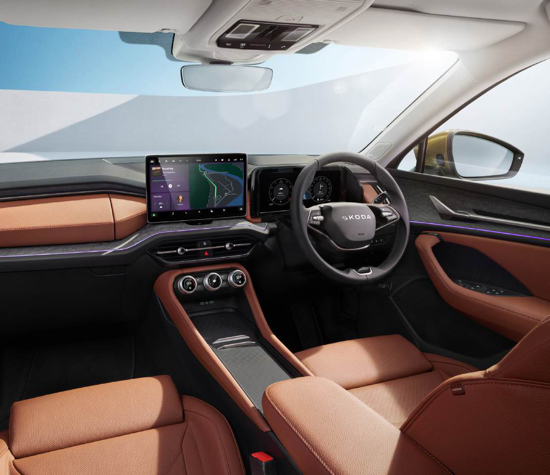 Skoda Kodiaq — Free-standing central touchscreen and digital cockpit in a cognac-leather cabin