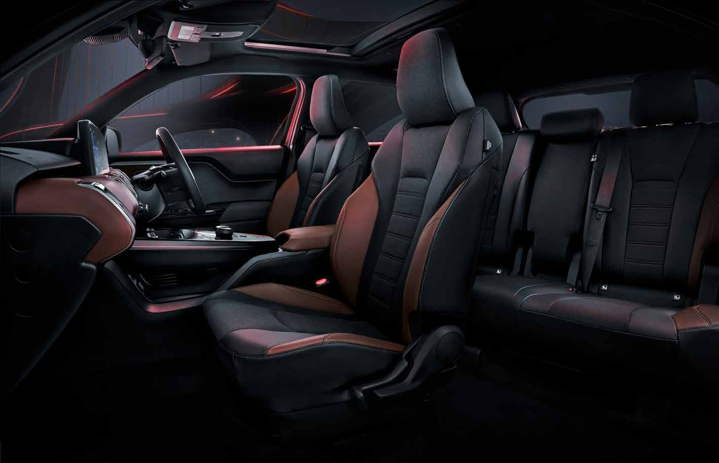Toyota Urban Cruiser Ebella — Dual-tone cabin with black and tan upholstery and flat-folding rear seats
