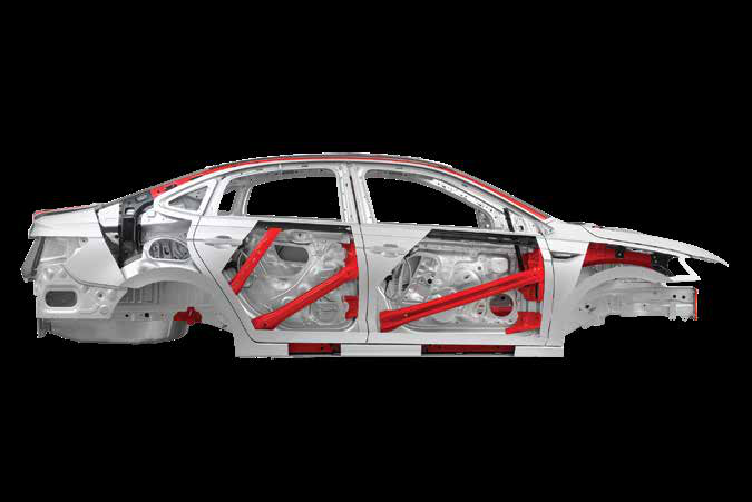Skoda Slavia — High-strength steel body frame with reinforced zones highlighted in red.