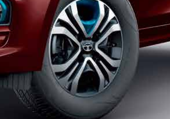 Tata Tigor EV — 14-inch Hyperstyle wheels with EV-blue inserts, wearing 175/65 R14 low rolling resistance tyres