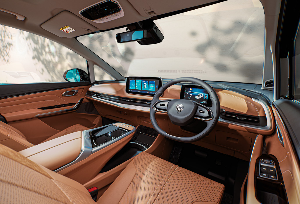 MG M9 — Twin-screen dashboard with central touchscreen infotainment and digital driver display.