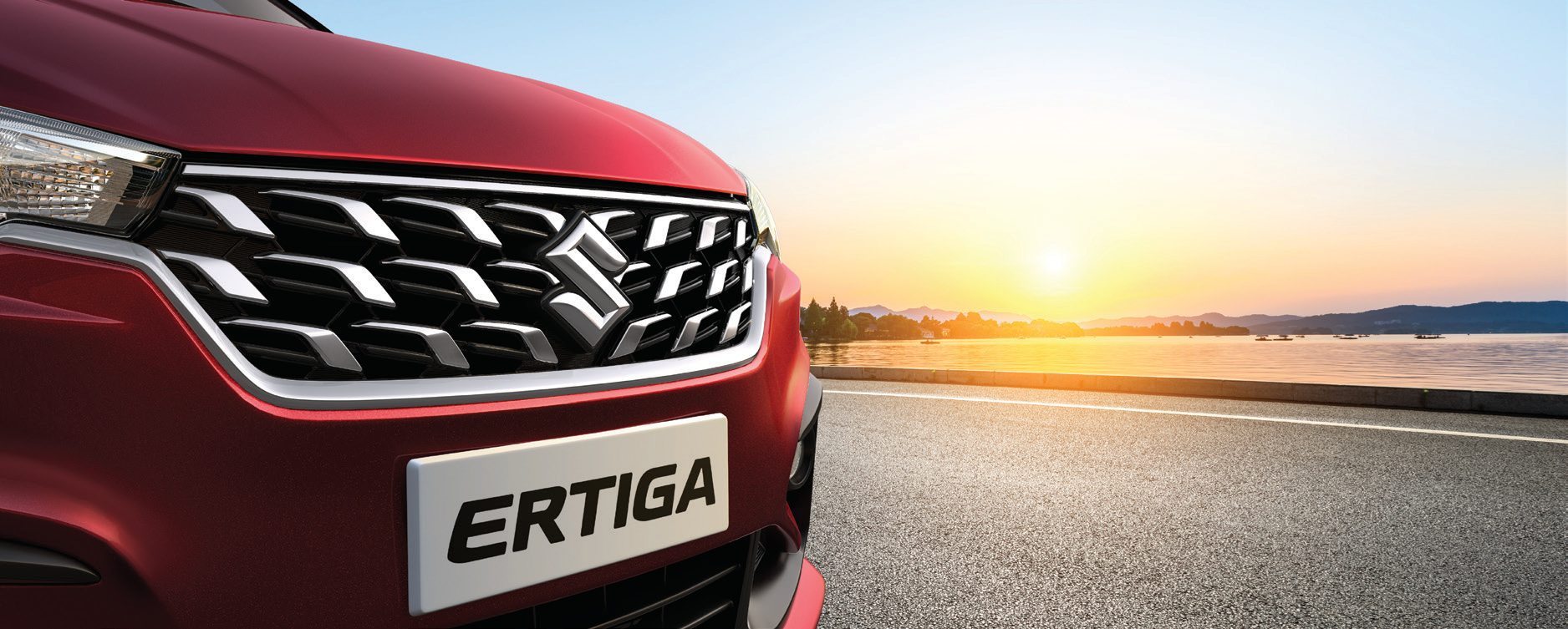 Maruti Suzuki Ertiga — Dynamic chrome winged front grille with Suzuki emblem