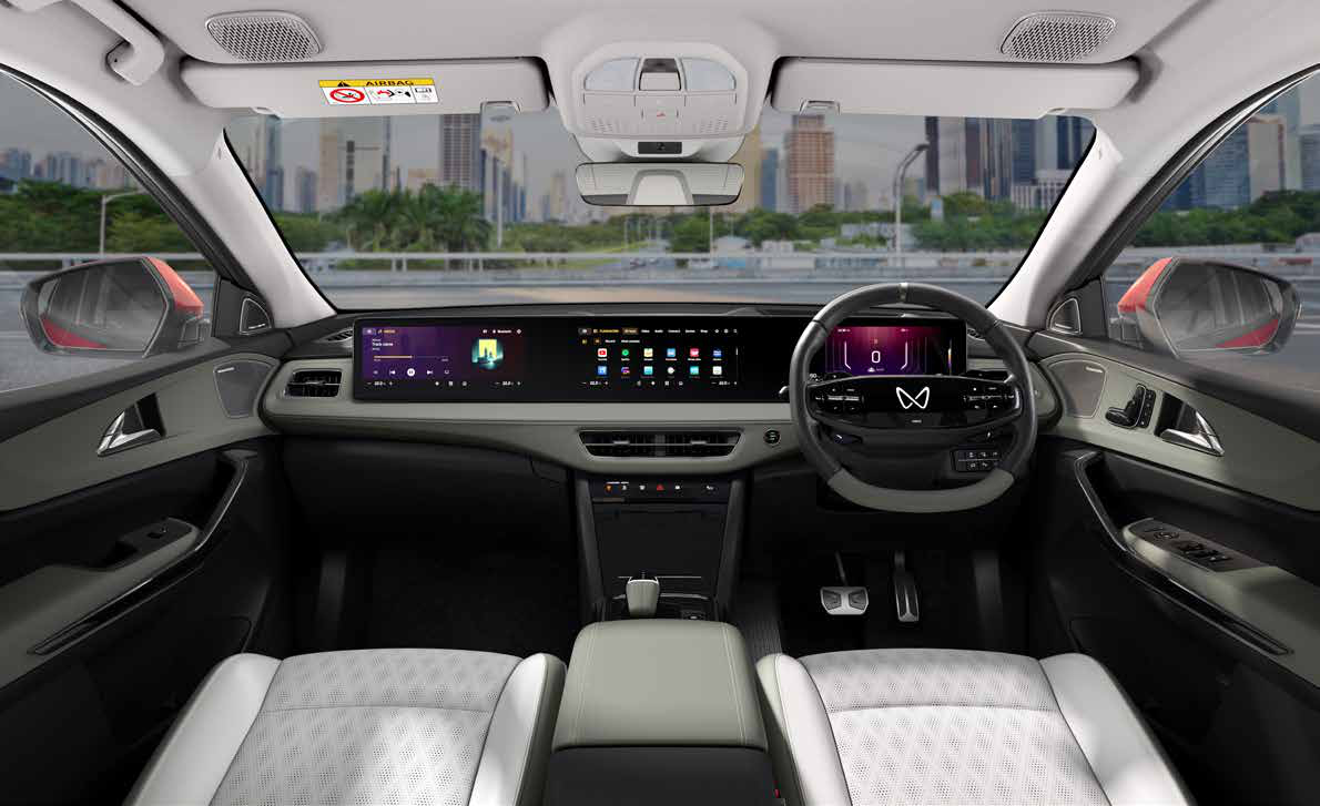 Mahindra XEV 9e — Wide cinemascope three-screen high-definition display