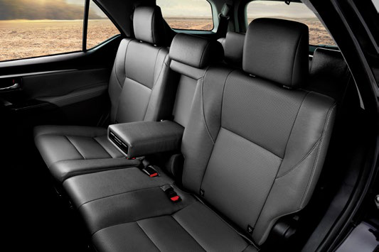 Toyota Fortuner — Second-row perforated leather seats with fold-down centre armrest
