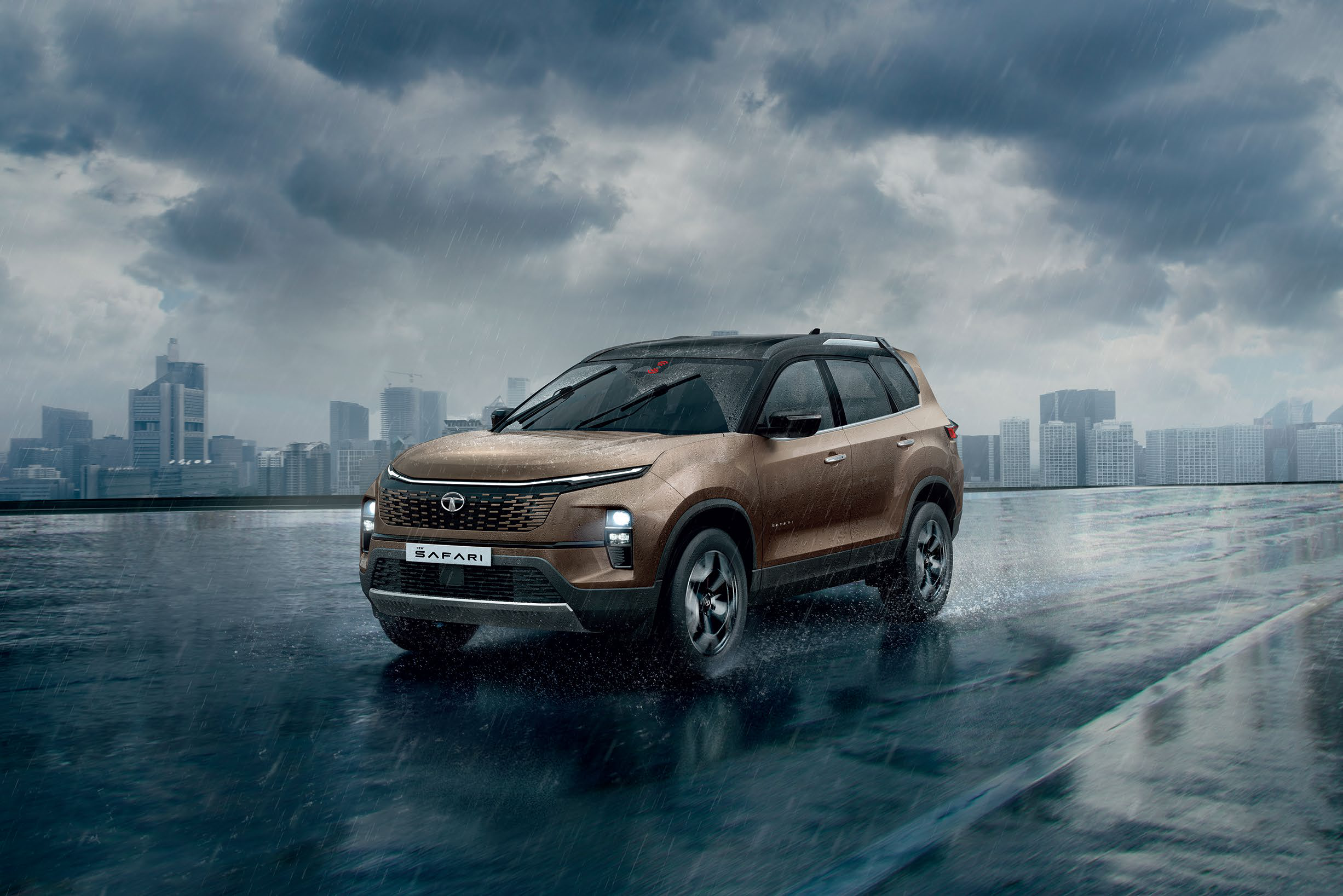 Tata Safari — Auto headlamps and rain-sensing wipers with mist spray