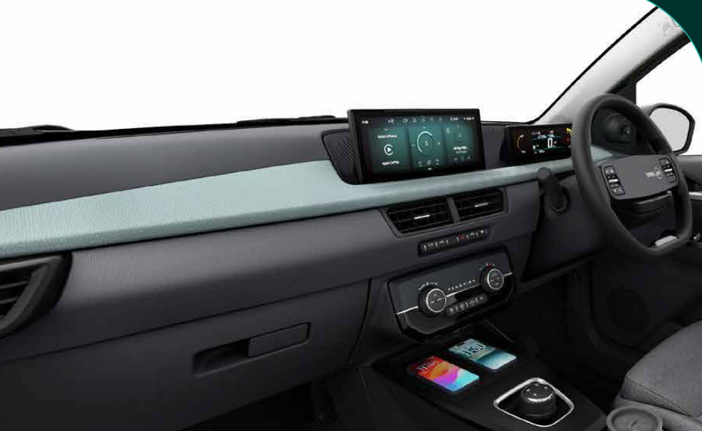 Tata Tiago EV — Fabricia Luxe layered dashboard with dual-tone theme and floating touchscreen
