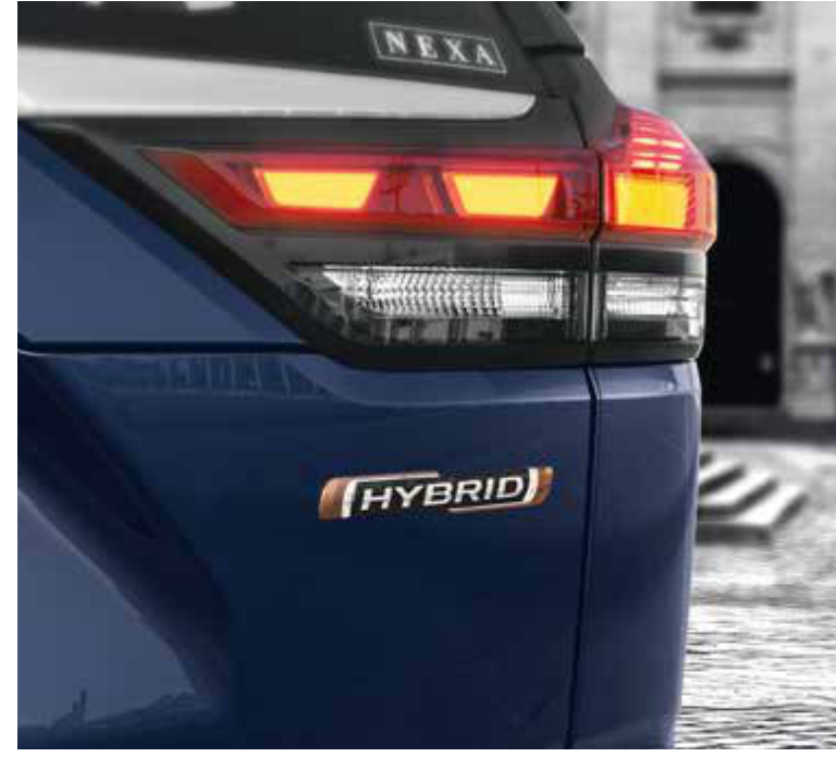 Maruti Suzuki Invicto — “HYBRID” badge beneath the NEXTre LED tail lamp, denoting the Intelligent Electric Hybrid powertrain.
