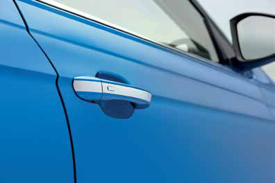 Skoda Slavia — KESSY keyless entry with a chrome door handle and touch sensor.