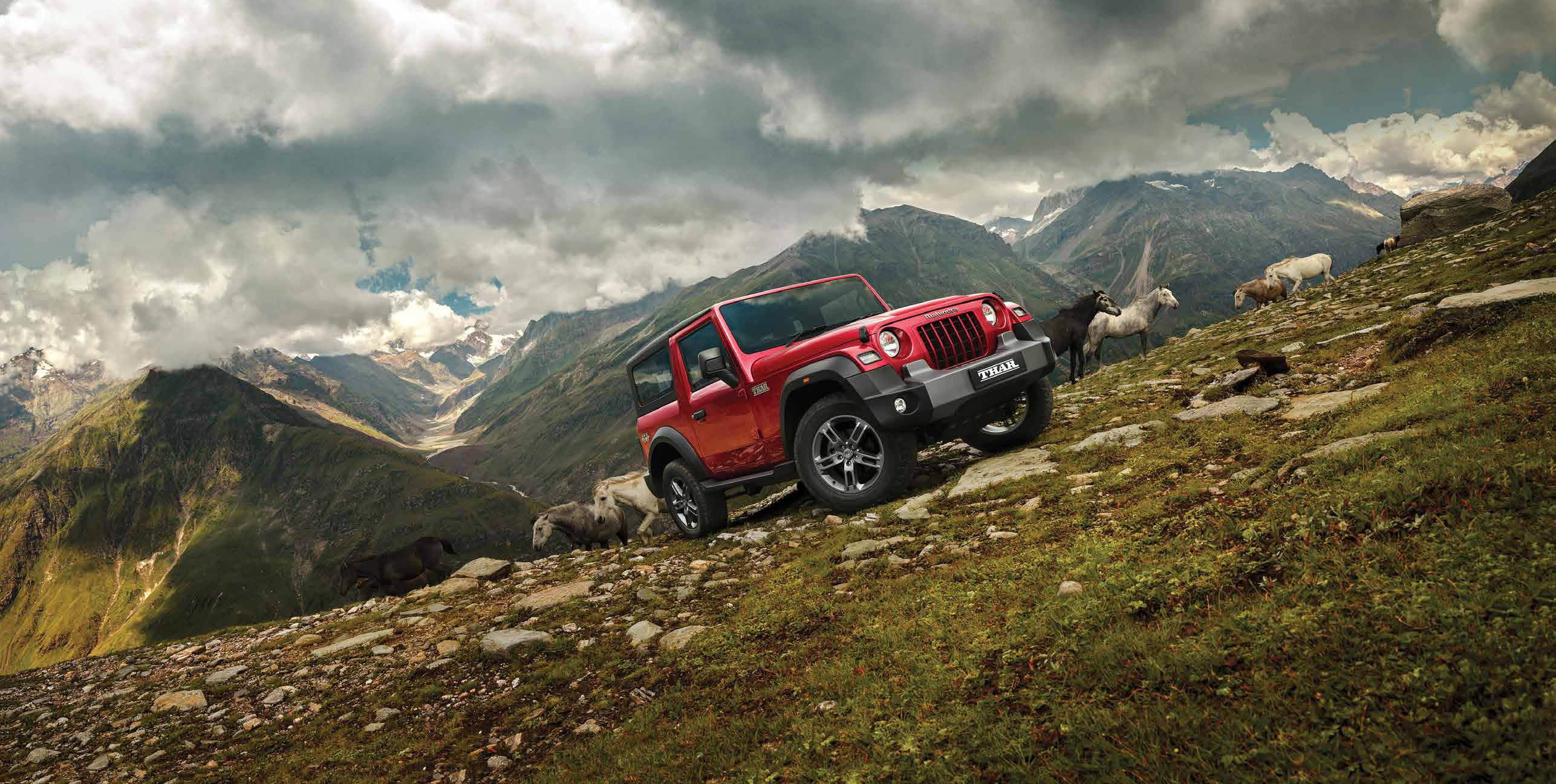 Mahindra Thar — Iconic front profile with round headlamps and body-coloured grille