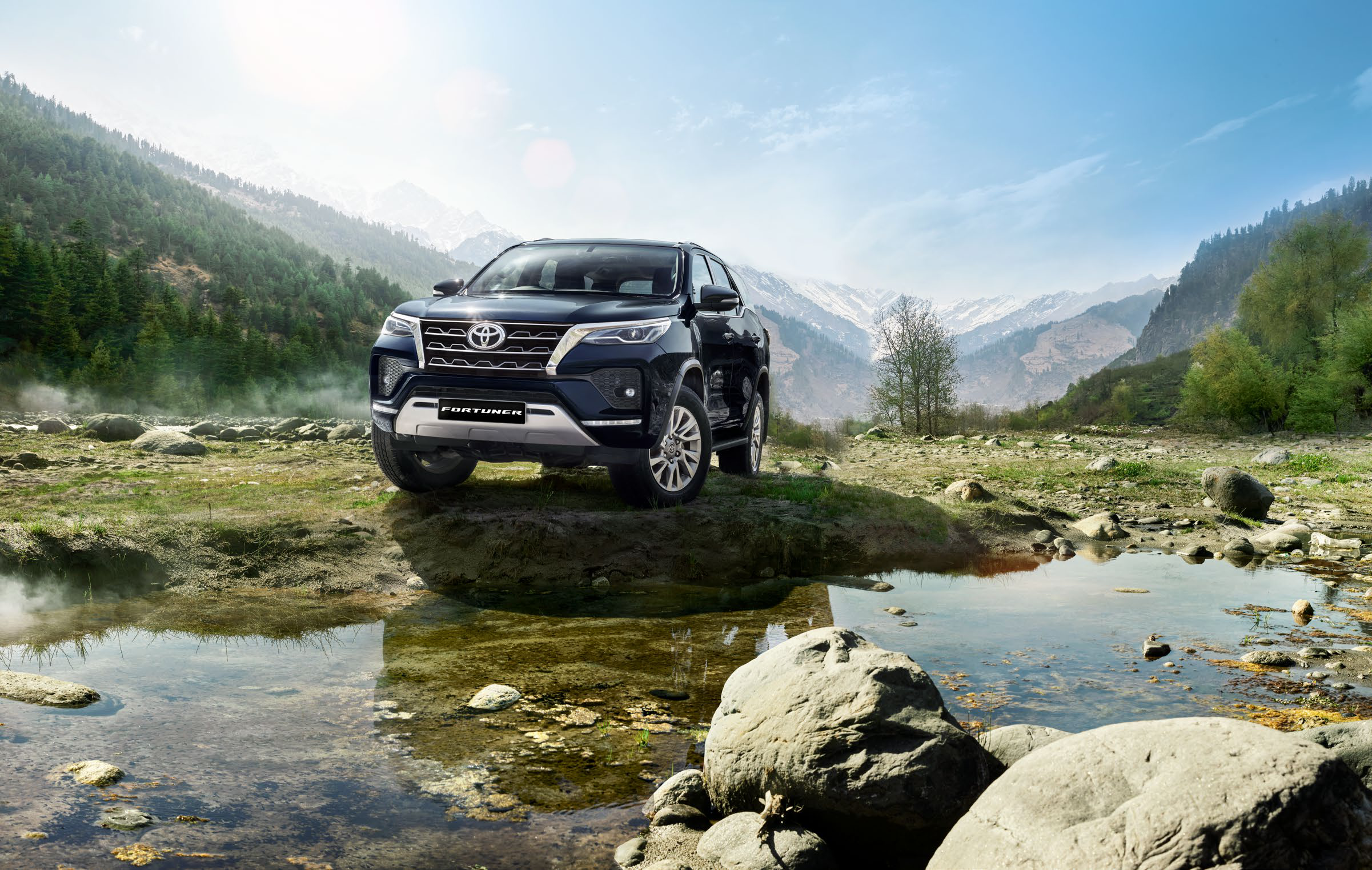 Toyota Fortuner — Front three-quarter stance with chrome trapezoid grille and full-LED headlamps