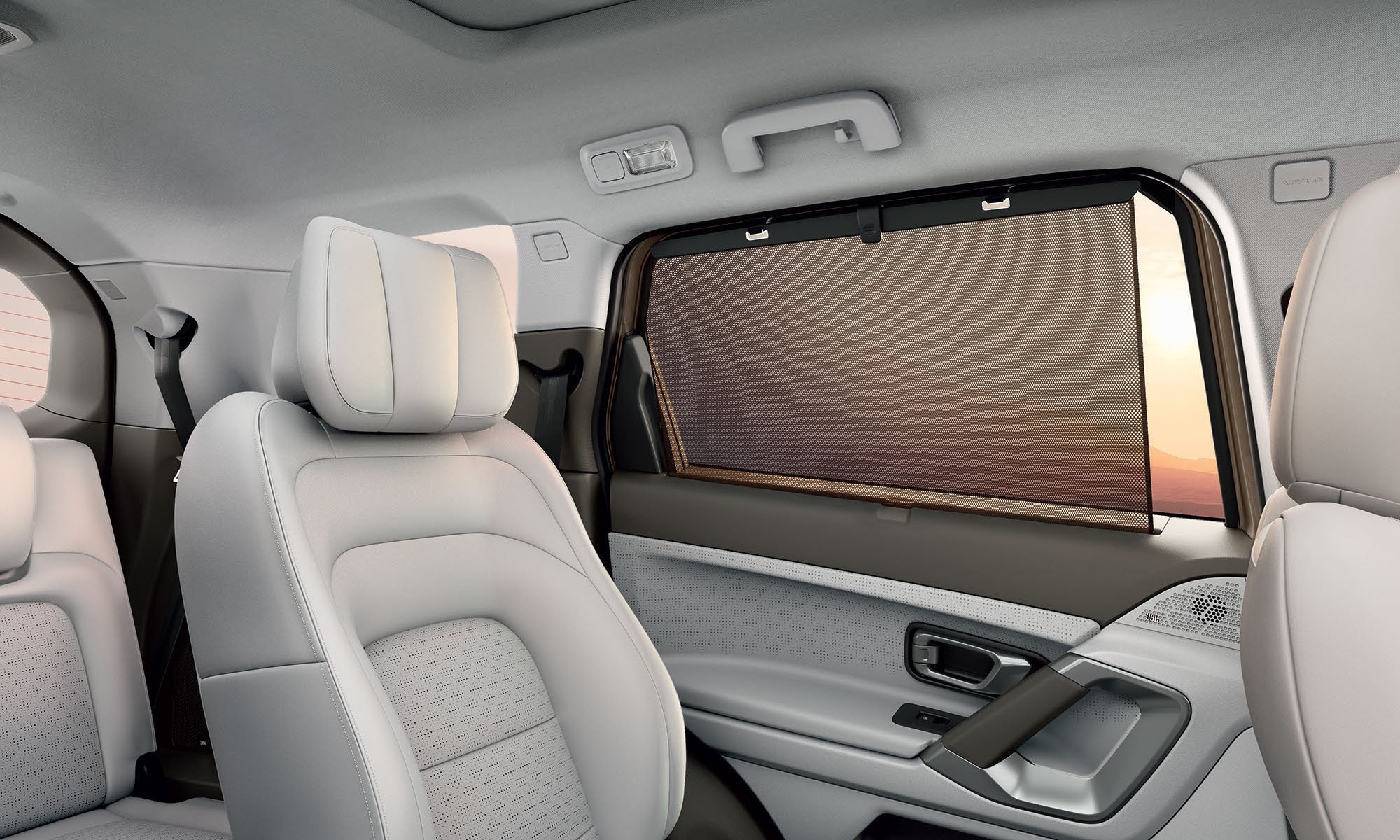 Tata Safari — 2nd row roll-up sun blinds for shade, privacy and a cooler cabin