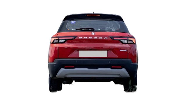 Red Maruti Brezza SUV rear view with black roof and gray bumper skid plate.