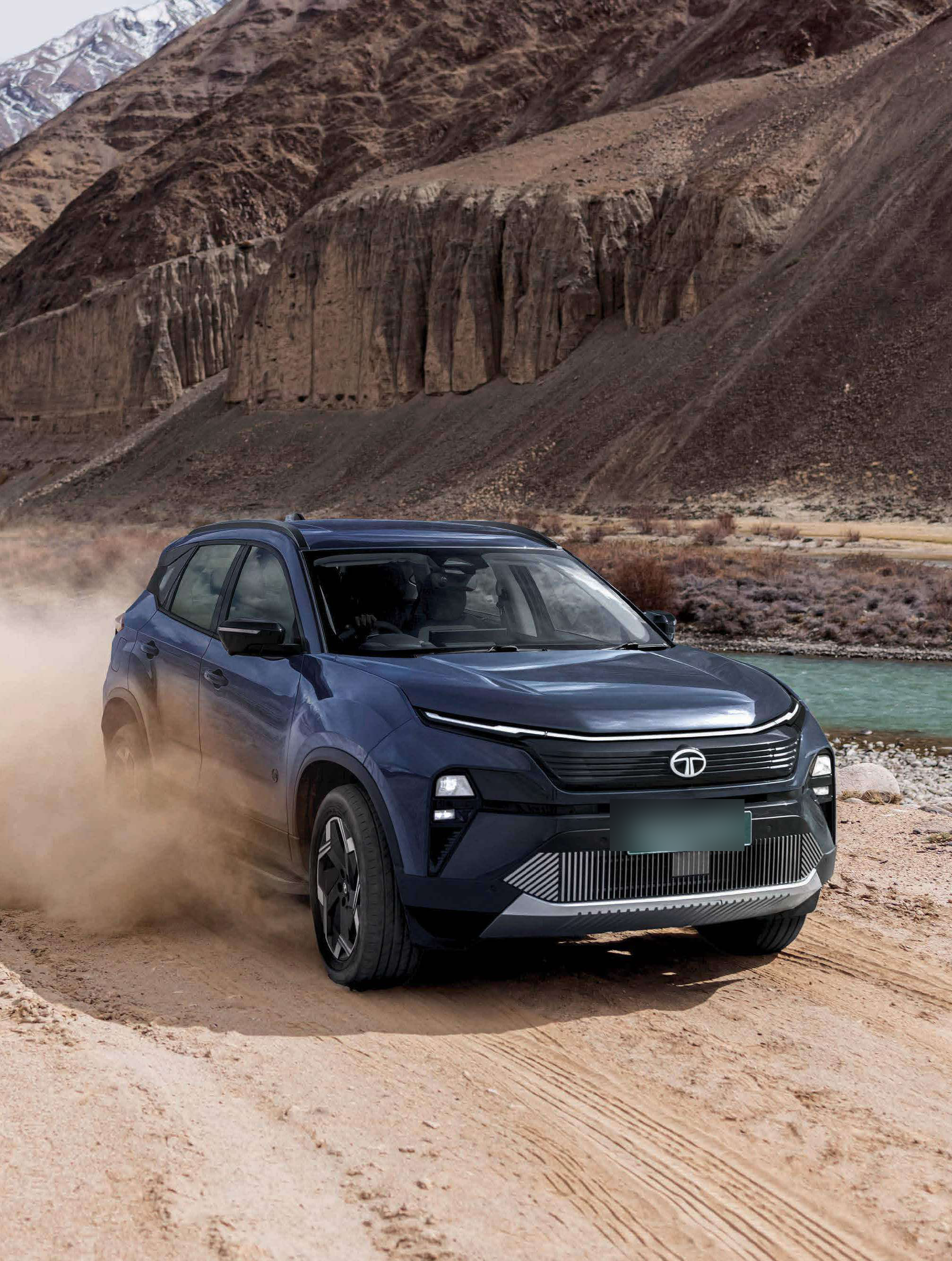 Tata Harrier EV — Signature end-to-end connected LED DRLs give the front a full-width light bar